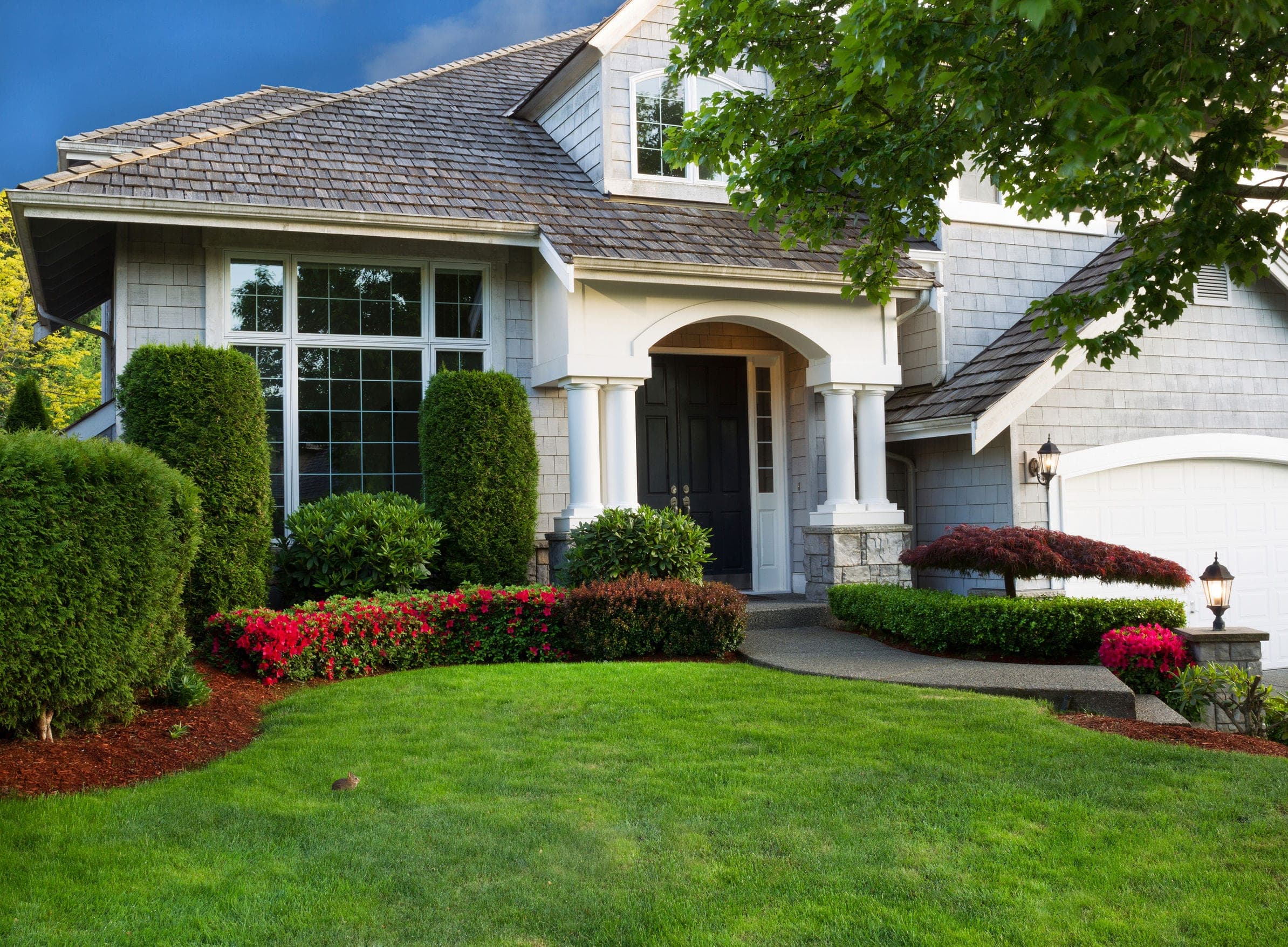 home exterior with clean landscaping