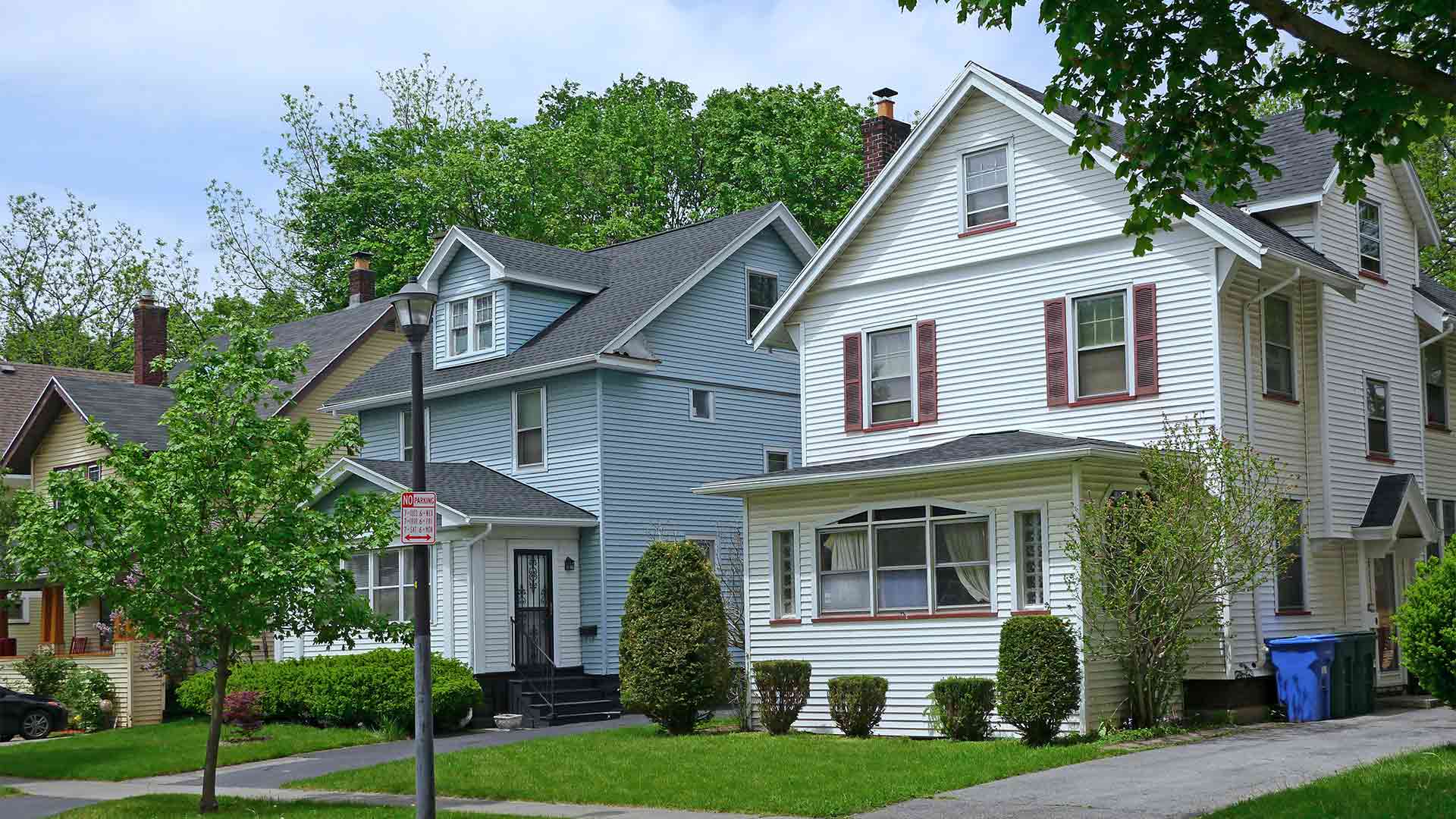 Row of colorful two-story homes in a middle class suburb