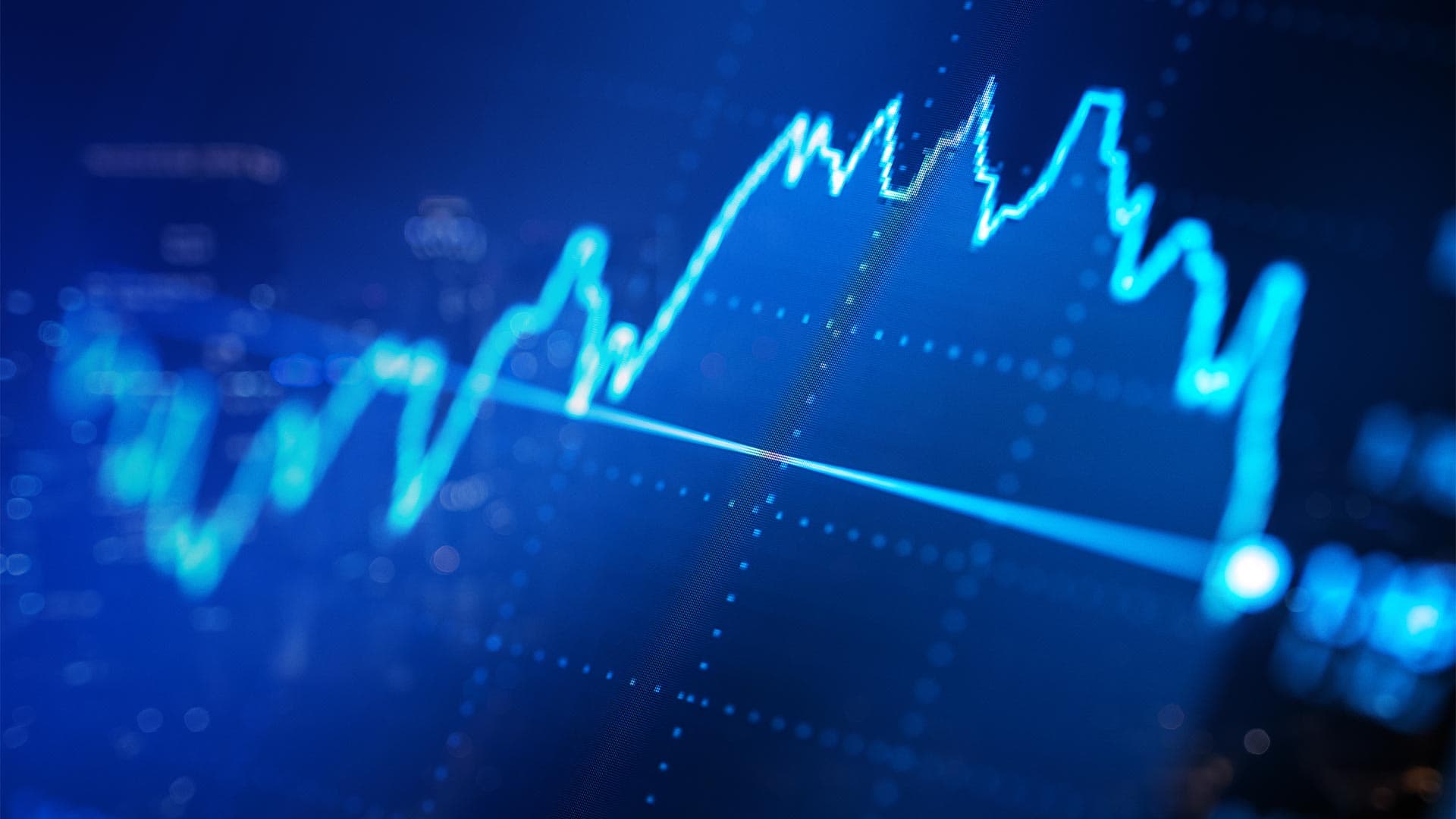 Interest rate chart on a screen showing interest rates falling