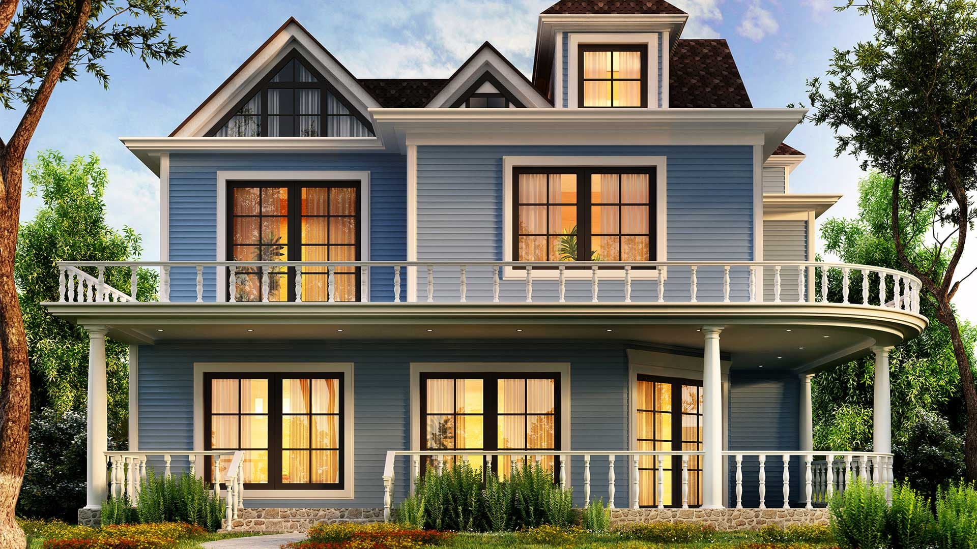 Front view of a large blue house with top and bottom decks, lit from the interior
