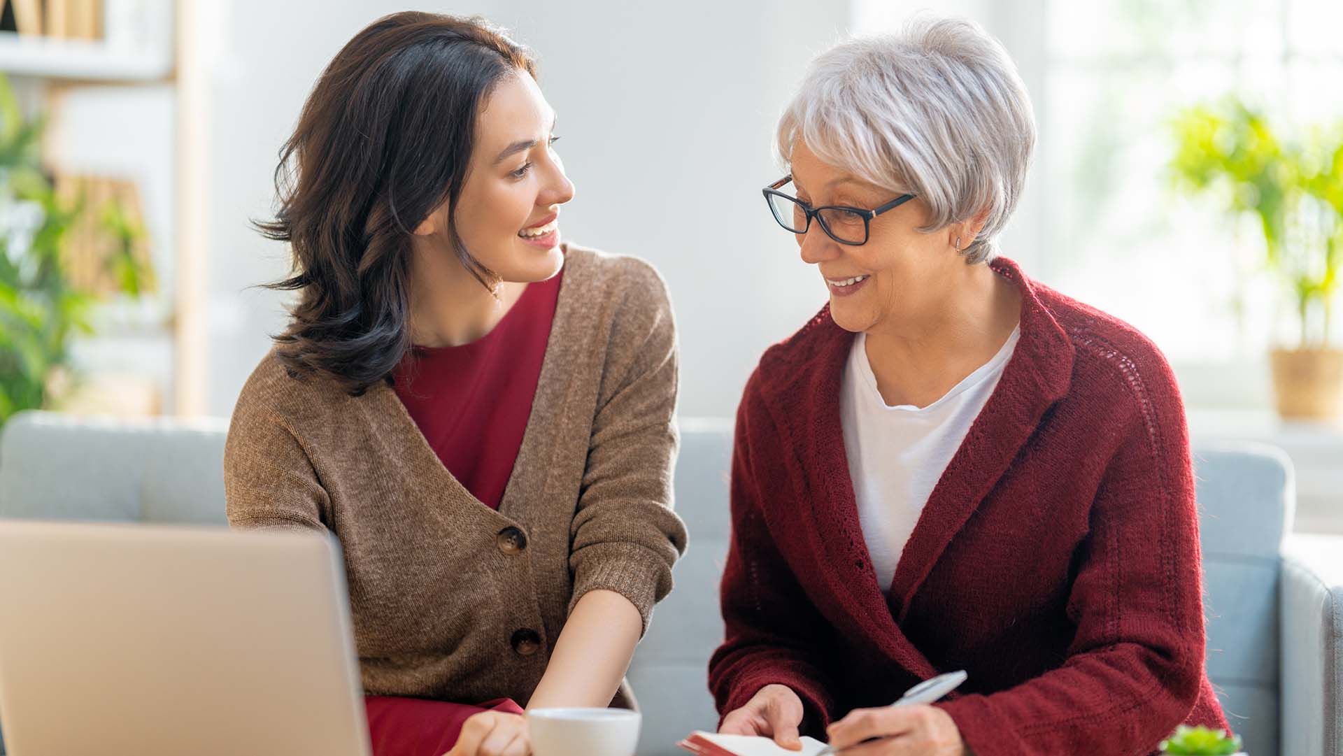 Mother and daughter at a laptop computer